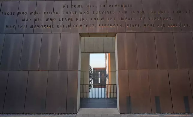 The inscription above the entrance to the Oklahoma City National Memorial &amp; Museum reads, "We come here to remember those who were killed, those who survived and those changed forever. May all who leave here know the impact of violence. May this memorial offer comfort, strength, peace, hope and serenity," in Oklahoma City on March 13, 2025. (AP Photo/LM Otero)