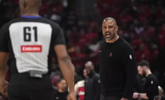 Houston Rockets head coach Ime Udoka talks to official Courtney Kirkland after a call during the first half of Game 2 of an NBA basketball first-round playoff series against the Houston Rockets in Houston, Wednesday, April 23, 2025. (AP Photo/Karen Warren)