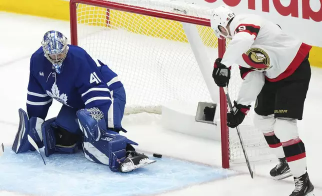 Toronto Maple Leafs' goaltender Anthony Stolarz (41) makes a save against Ottawa Senators' Drake Batherson (19) during first period NHL playoff action in Toronto on Tuesday, April 29, 2025. (Nathan Denette/The Canadian Press via AP)