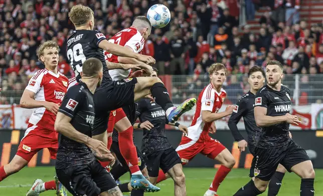 Berlin's Andrej Ilic scores during the Bundesliga soccer match between 1. FC Union Berlin and VfB Stuttgart in Berlin, Saturday April 19, 2025. (Andreas Gora/dpa via AP)