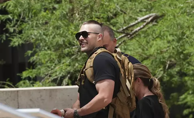 Colby Ryan arrives at Maricopa County Superior Court for the murder trial of Lori Vallow Daybell, his mother, who's charged with conspiring to murder her estranged husband, Monday, April 21, 2025, in Phoenix. (AP Photo/Ross D. Franklin)