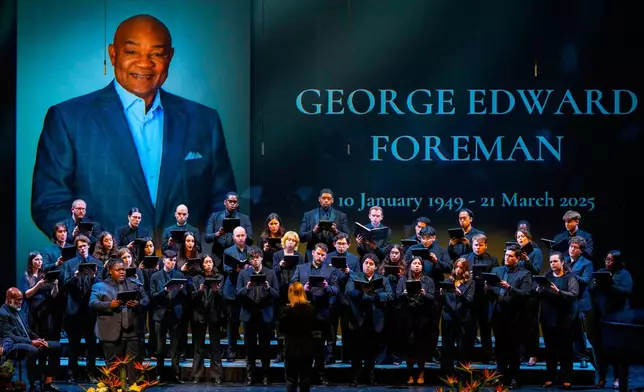 The University of Houston Choir sings "If I Can Help Somebody" during a memorial service for Olympic and world champion boxer and minister George Foreman at Wortham Theater Center in Houston, Monday, April 14, 2025. (Brett Coomer/Houston Chronicle via AP)