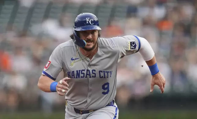 Kansas City Royals' Vinnie Pasquantino advances to third base against the Detroit Tigers in the first inning during a baseball game, Friday, April 18, 2025, in Detroit. (AP Photo/Paul Sancya)