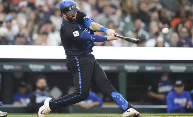 Detroit Tigers' Tomás Nido hits a one-run single against the Kansas City Royals in the second inning during a baseball game, Friday, April 18, 2025, in Detroit. (AP Photo/Paul Sancya)