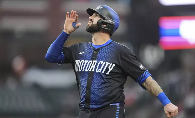 Detroit Tigers' Tomás Nido reacts to his one-run single against the Kansas City Royals in the second inning during a baseball game, Friday, April 18, 2025, in Detroit. (AP Photo/Paul Sancya)