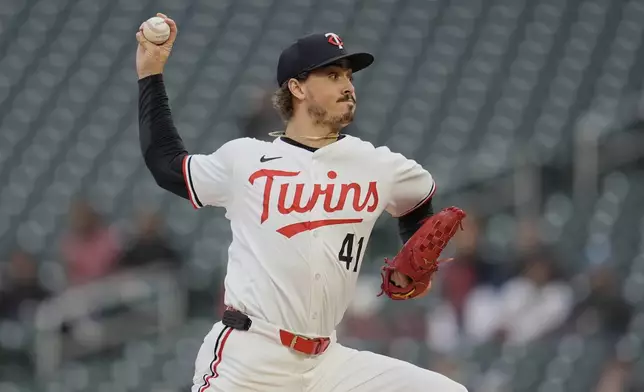 Minnesota Twins starting pitcher Joe Ryan (41) delivers during the first inning of a baseball game against the New York Mets, Monday, April 14, 2025, in Minneapolis. (AP Photo/Abbie Parr)