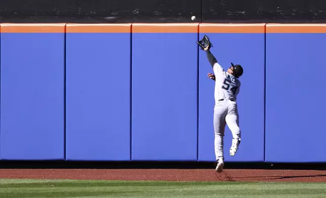 Miami Marlins' outfielder Dane Myers catches a ball hit by New York Mets' Pete Alonso during the ninth inning of a baseball game, Wednesday, April 9, 2025, in New York. (AP Photo/Pamela Smith)