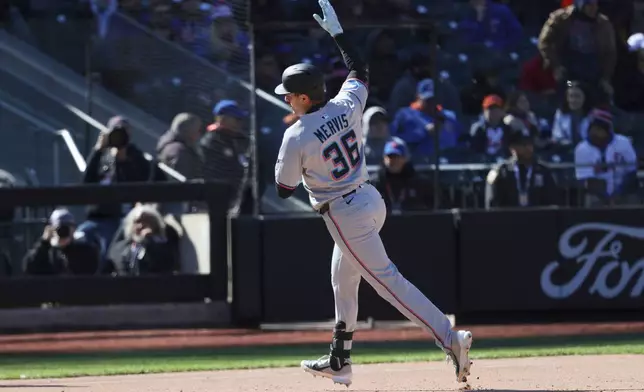 Miami Marlins' Matt Mervis runs the bases after hitting a 2-run home run during the ninth inning of a baseball game against the New York Mets, Wednesday, April 9, 2025, in New York. (AP Photo/Pamela Smith)