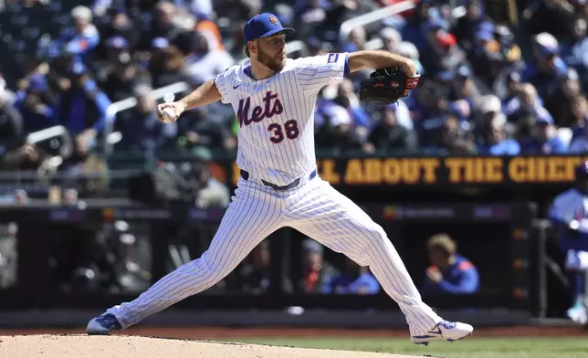 New York Mets' Tylor Megill pitches during the first inning of a baseball game against the Miami Marlins, Wednesday, April 9, 2025, in New York. (AP Photo/Pamela Smith)