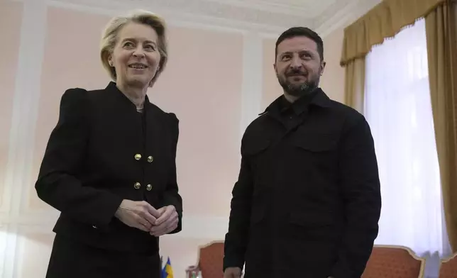 European Commission President Ursula von der Leyen, left, speaks with Ukraine's President Ukraine Volodymyr Zelenskyy prior to a bilateral meeting in Rome, Italy, Saturday April 26, 2025. (AP Photo/Andrew Medichini, Pool)