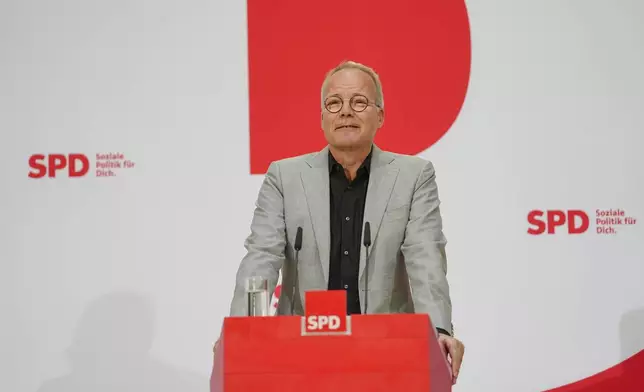 SPD General Secretary Matthias Miersch announces the result of the members' vote for the coalition between the CDU, CSU and SPD at the Willy Brandt House in Berlin, Germanym Wednesday April 30, 2025. (Kay Nietfeld/dpa via AP)