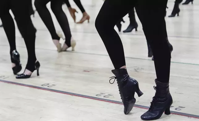 Dancers rehearse choreography before an audition for the Radio City Rockettes at Radio City Music Hall, Tuesday, April 22, 2025, in New York. (AP Photo/Julia Demaree Nikhinson)