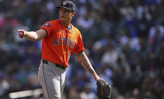 Houston Astros starting pitcher Hunter Brown (58) reacts after the second inning of a baseball game against the Seattle Mariners, Wednesday, April 9, 2025, in Seattle. (AP Photo/Lindsey Wasson)
