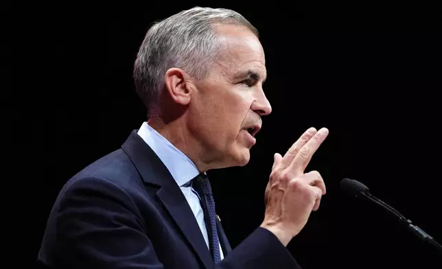 Canadian Prime Minister Mark Carney speaks on stage at his campaign headquarters after the Liberal Party won the Canadian election in Ottawa on Tuesday, April 29, 2025. (Justin Tang/The Canadian Press via AP)
