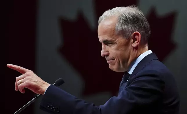 Canadian Prime Minister Mark Carney addresses supporters at Liberal campaign headquarters in Ottawa, Tuesday, April 29, 2025. (Sean Kilpatrick/The Canadian Press via AP)
