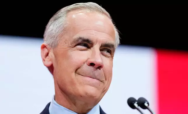 Canadian Prime Minister Mark Carney speaks to supporters on stage at his campaign headquarters after the Liberal Party won the Canadian election in Ottawa, Ontario, Tuesday, April 29, 2025. (Justin Tang/The Canadian Press via AP)