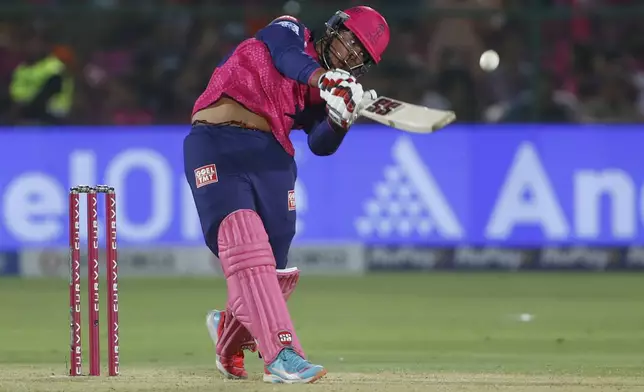 Rajasthan Royals' Vaibhav Suryavanshi hits a boundary during the Indian Premier League cricket match between Rajasthan Royals and Gujarat Titans at Sawai Mansingh Stadium in Jaipur, India, Monday, April 28, 2025. (AP Photo/Surjeet Yadav)