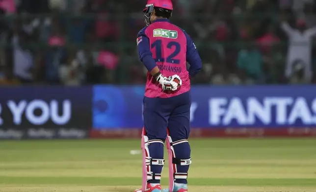 Rajasthan Royals' Vaibhav Suryavanshi celebrates after scoring fifty runs during the Indian Premier League cricket match between Rajasthan Royals and Gujarat Titans at Sawai Mansingh Stadium in Jaipur, India, Monday, April 28, 2025. (AP Photo/Surjeet Yadav)