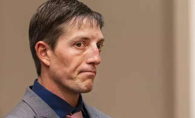 FILE - Ex-Grand Rapids police officer Christopher Schurr appears for the second day of his preliminary examination at the Kent County Courthouse in Grand Rapids, Mich., Friday, Oct. 28, 2022. (Joel Bissell/The Grand Rapids Press via AP, File, File)