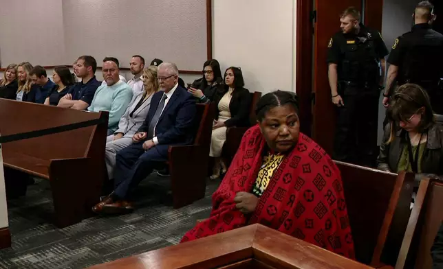 This image made from video provided by WOOD-TV shows Patrick Lyoya's mother, Dorcas, as she sits in court on the first day of Christopher Schurr's trial in the Kent County Courthouse in Grand Rapids, Mich., Monday, April 28, 2025. (WOOD-TV via AP, Pool)