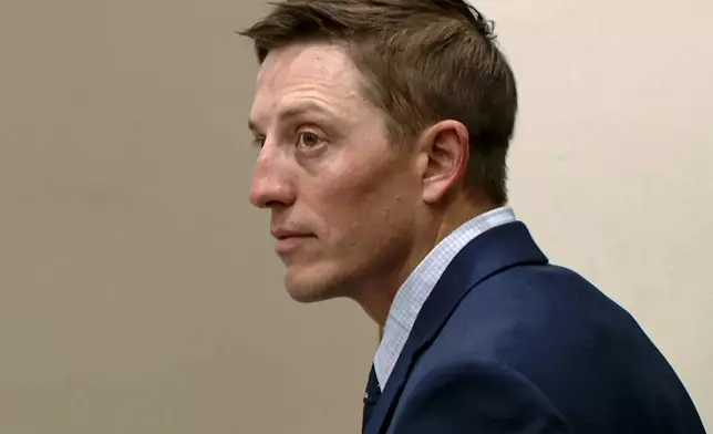 This image made from video provided by WOOD-TV shows Christopher Schurr in court at the Kent County Courthouse in Grand Rapids, Mich., on the first day of his trial, Monday, April 28, 2025. (WOOD-TV via AP, Pool)