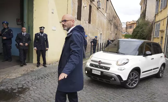 A car with Pope Francis enters the Regina Coeli penitentiary in Rome on Holy Thursday, Thursday, April 17, 2025. (AP Photo/Andrew Medichini)