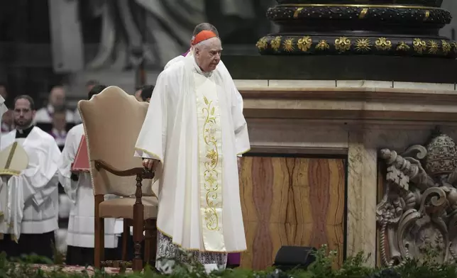 Delegate of the Holy Father, Cardinal Domenico Calcagno presides over the Chrism Mass inside St. Peter's Basilica at The Vatican, Thursday, April 17, 2025. (AP Photo/Andrew Medichini)