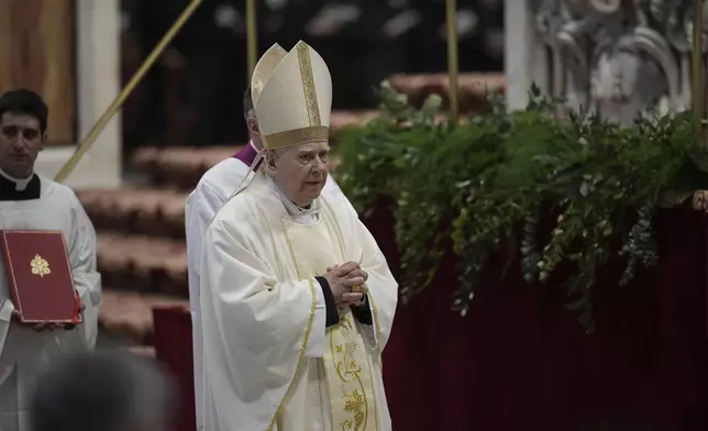 Delegate of the Holy Father, Cardinal Domenico Calcagno, presides over the Chrism Mass inside St. Peter's Basilica at The Vatican, Thursday, April. 17, 2025. (AP Photo/Andrew Medichini)