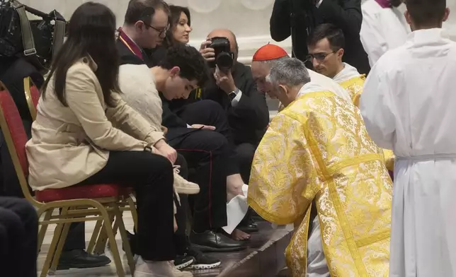Cardinal Mauro Gambetti presides over a mass inside St. Peter's Basilica at The Vatican on Holy Thursday to commemorate Christ¥s Last Supper before his crucifixion, Thursday, April 17, 2025. (AP Photo/Gregorio Borgia)