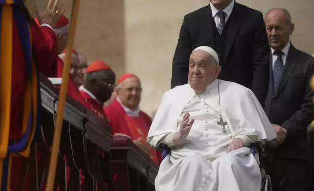 Pope Francis arrives at the end of the mass on Palm Sunday in St. Peter's Square at The Vatican, Sunday, April 13, 2025. (AP Photo/Gregorio Borgia)