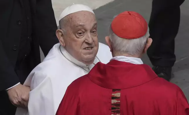 Pope Francis arrives at the end of the mass on Palm Sunday in St. Peter's Square at The Vatican, Sunday, April 13, 2025. (AP Photo/Alessandra Tarantino)