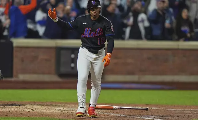 New York Mets' Francisco Lindor (12) celebrates after hitting a walk-off home run during the ninth inning of a baseball game against the St. Louis Cardinals Friday, April 18, 2025, in New York. (AP Photo/Frank Franklin II)