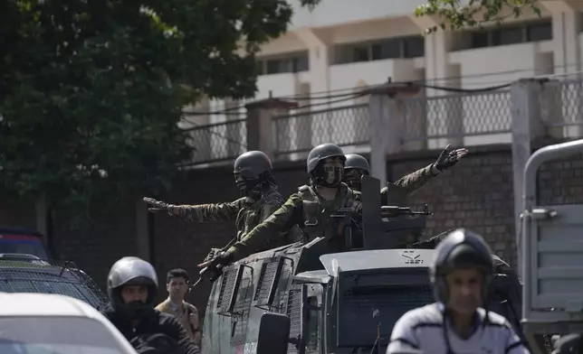 Indian soldiers guard in Srinagar, Indian controlled Kashmir, Wednesday, April. 23, 2025. (AP Photo/Mukhtar Khan)