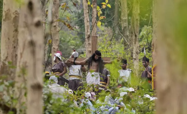 Christians reenact the crucifixion of Jesus Christ in Guwahati, India, on Good Friday, April 18, 2025. (AP Photo/Anupam Nath)
