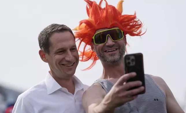 FILE - San Francisco mayoral candidate Daniel Lurie, left, poses for a photo with Martin Damyan, who says he voted for Lurie, in San Francisco, Saturday, Oct. 26, 2024. (AP Photo/Jeff Chiu, File)
