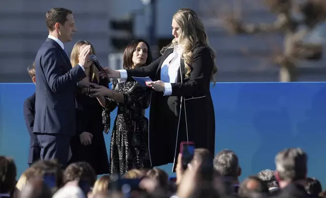FILE - Mayor Daniel Lurie, left, takes the oath of office during his inauguration Wednesday, Jan. 8, 2025, in San Francisco. (AP Photo/Godofredo A. Vásquez, File)