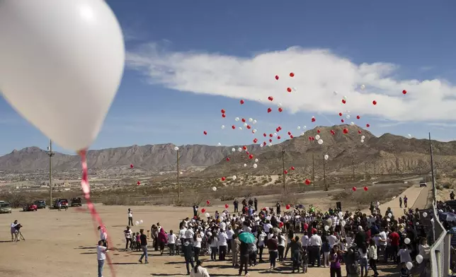 FILE— Balloons representing the hopes and struggle of immigrant communities are released during an event organized by the Border Network for Human Rights organization along the border fence on the outskirts of Ciudad Juarez, Mexico, Feb. 15, 2016. (AP Photo/Ivan Pierre Aguirre, File)