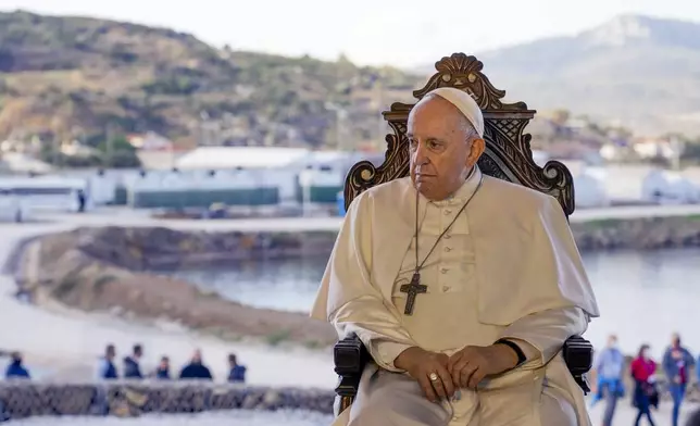 FILE— Pope Francis attends a ceremony at the Karatepe refugee camp on the Aegean island of Lesbos, Greece, Dec. 5, 2021. (AP Photo/Alessandra Tarantino, File)