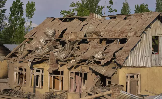 Blown-up family home of Ahsan Ul Haq Shiekh, a militant who officials say is involved in the deadly attack on tourists in Pahalgam, is seen at Murran village in Pulwama, south of Srinagar, Indian controlled Kashmir, Saturday, April 26, 2025. (AP Photo/Dar Yasin)