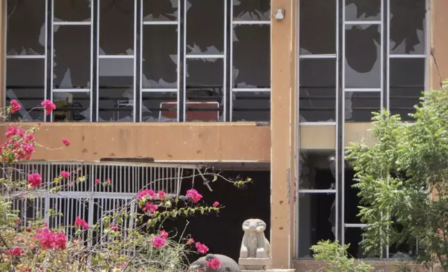 Windows of the Sudan National Museum, the home to the country's largest artifacts that date to different eras of Sudanese history, are shattered after nearly two years of war between the army and paramilitary Rapid Support Forces (RSF), in Khartoum, Sudan, Thursday, April 3, 2025. (AP Photo/Khaled Abd Al Gader)
