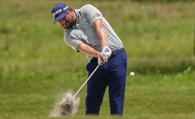 Andrew Novak hits along the 2nd fairway during the final round of the PGA Zurich Classic golf tournament at TPC Louisiana in Avondale, La., Sunday, April 27, 2025. (AP Photo/Gerald Herbert)