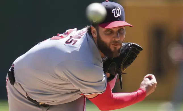 Washington Nationals pitcher Trevor Williams delivers during the first inning of a baseball game against the Pittsburgh Pirates in Pittsburgh, Thursday, April 17, 2025. (AP Photo/Gene J. Puskar)
