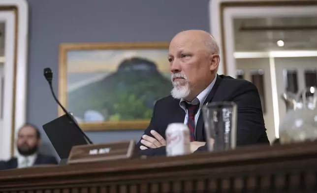 Rep. Chip Roy, R-Texas, a member of the conservative House Freedom Caucus, listens as the Republican plan to advance President Donald Trump's top domestic priorities on spending reductions and tax breaks is prepared in the House Rules Committee for a floor vote, at the Capitol in Washington, Wednesday, April 9, 2025. The deficit hawk has blasted the GOP plan drawing the ire of both Trump and House Speaker Mike Johnson. (AP Photo/J. Scott Applewhite)