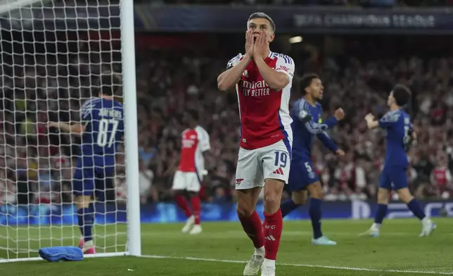 Arsenal's Leandro Trossard reacts after a missed scoring opportunity during the Champions League semifinal first leg soccer match between Arsenal and Paris Saint-Germain at Emirates Stadium in London, England, Tuesday, April 29, 2025. (AP Photo/Kirsty Wigglesworth)