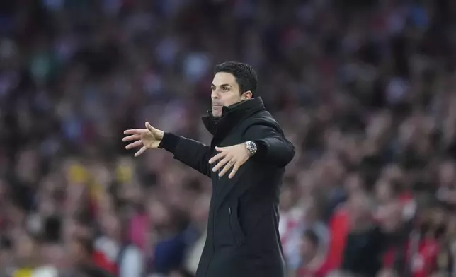 Arsenal's manager Mikel Arteta gestures during the Champions League semifinal first leg soccer match between Arsenal and Paris Saint-Germain at Emirates Stadium in London, England, Tuesday, April 29, 2025. (AP Photo/Kirsty Wigglesworth)