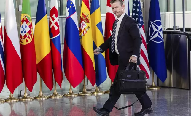 Sweden's Defense Minister Pal Jonson arrives for a meeting of the Ukraine Defence Contact Group at NATO headquarters in Brussels, Friday, April 11, 2025. (AP Photo/Geert Vanden Wijngaert)