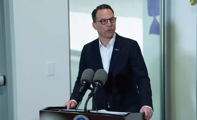 Pennsylvania Gov. Josh Shapiro visits the Hershey Company's new manufacturing plant in Hershey, Pa., Wednesday, April 16, 2025. (AP Photo/Matt Rourke)