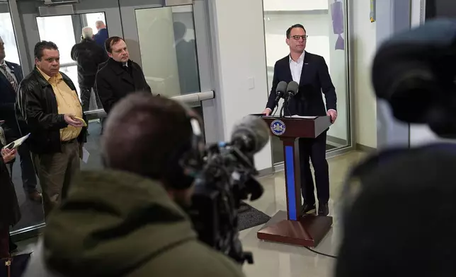 Pennsylvania Gov. Josh Shapiro visits the Hershey Company's new manufacturing plant in Hershey, Pa., Wednesday, April 16, 2025. (AP Photo/Matt Rourke)