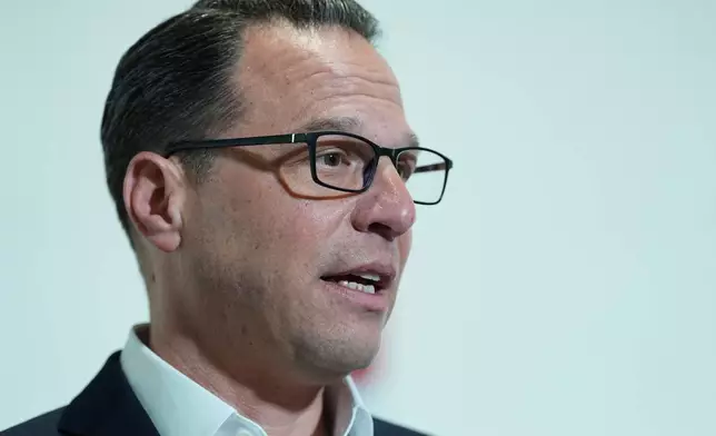 Pennsylvania Gov. Josh Shapiro visits the Hershey Company's new manufacturing plant in Hershey, Pa., Wednesday, April 16, 2025. (AP Photo/Matt Rourke)