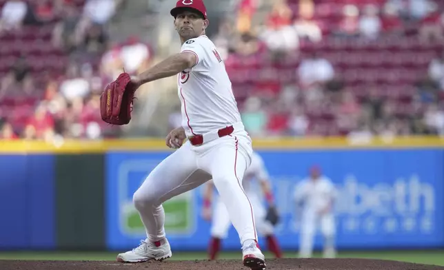 Cincinnati Reds' Nick Martinez delivers a pitch in the first inning of a baseball game against the St. Louis Cardinals, Monday, April 28, 2025, in Cincinnati. (AP Photo/Kareem Elgazzar)